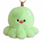 wllio.com light green plush octopus keychain with embroidered face and flower detail.