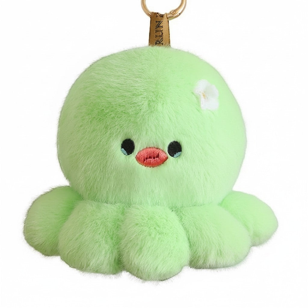 wllio.com light green plush octopus keychain with embroidered face and flower detail.