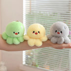 wllio.com green, yellow, and gray plush octopus keychains with soft stuffed animal design and cute facial features.