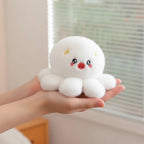 wllio.com white plush octopus keychain with cute embroidered face and yellow lightning bolt accents.
