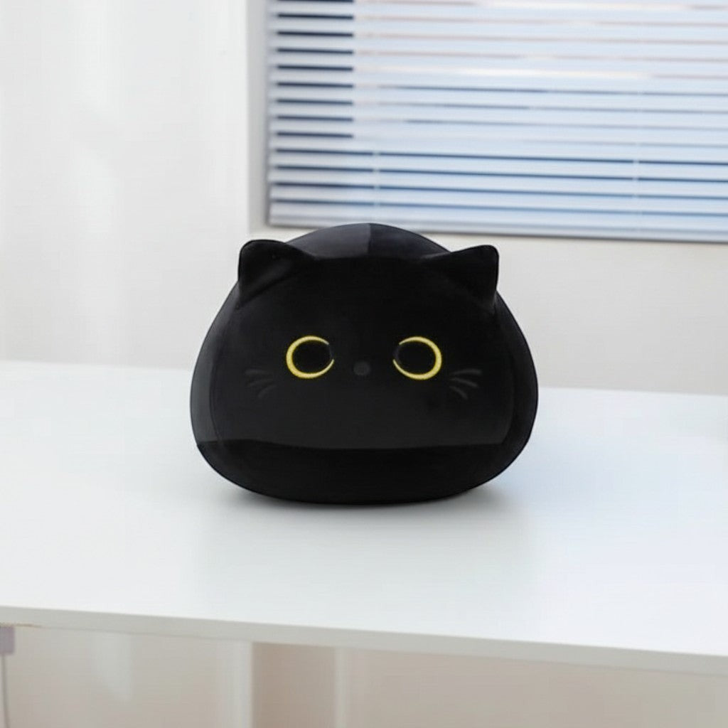 wllio.com black plush cat pillow with yellow eyes, pink cat pillow with blue eyes, and tan dog pillow with tongue out.